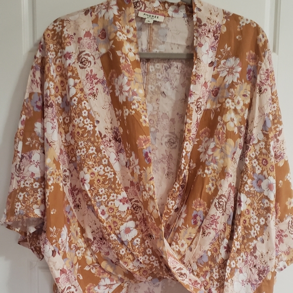 Boho floral top. Bell sleeves, crossover front, cool and breezy. - Picture 1 of 5